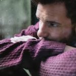 man looks thoughtful as a symbol of turn offs women and men