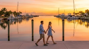 Couple walking at the harbor at sunset. 