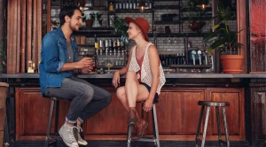 A couple enjoying the evenining in a pub.