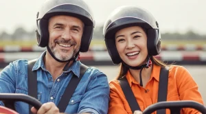 A couple is karting on a date. 