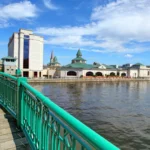 Skyline of Joliet from a bridge with river view.