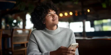 Man looks thoughtful and considers: "should i ask her out"